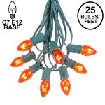 25 Light String Set with Amber/Orange Transparent C7 Bulbs on Green Wire